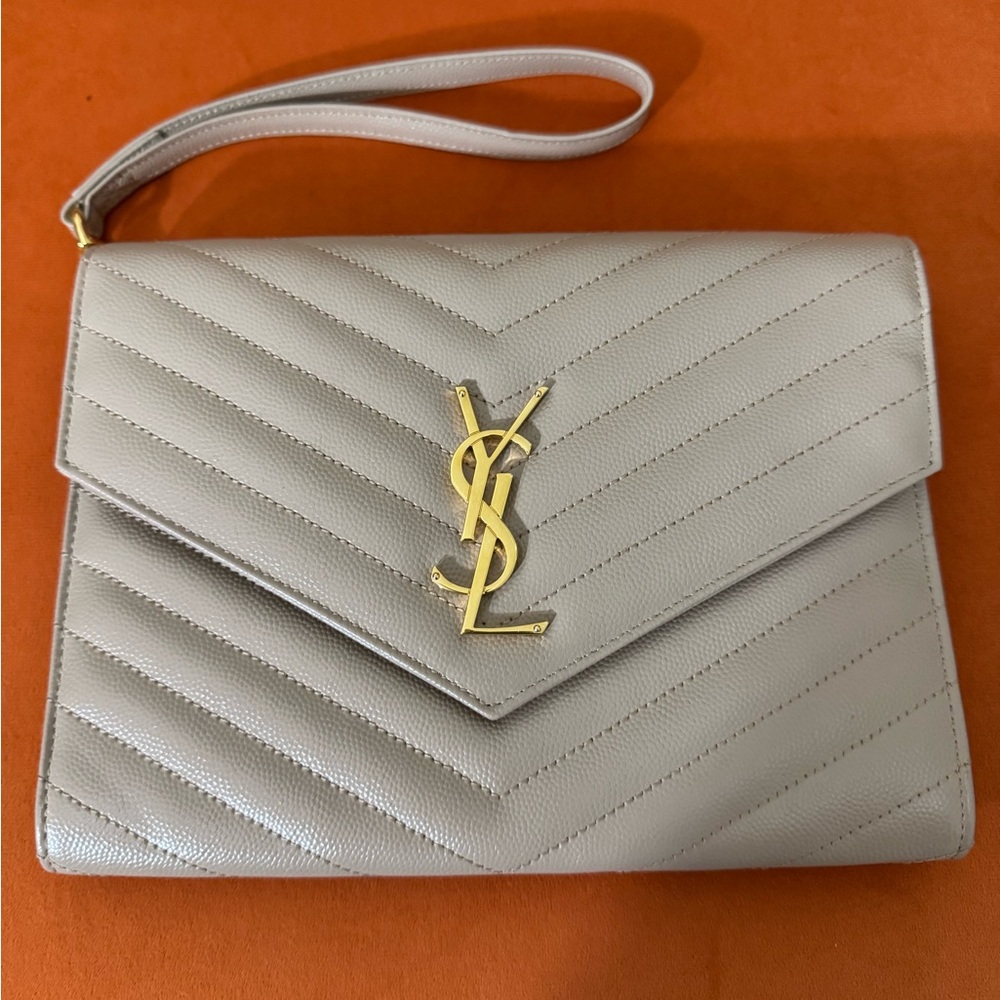 Saint Laurent GORGEOUS beige wristlet.😍
